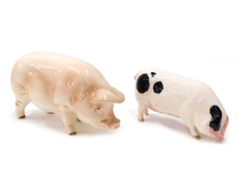 A Goebel figure of a pig, 10cm high, and a Royal Doulton figure of a pig. (2)