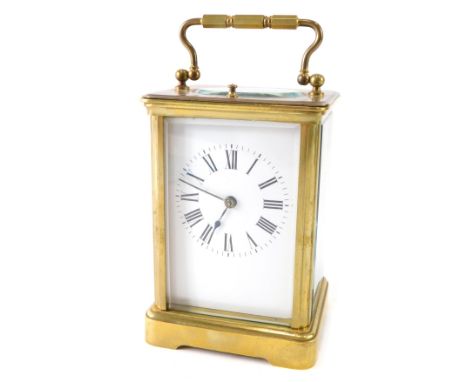 An early 20thC brass minute repeating carriage clock, with 6cm wide back plate, Roman numeric dial, single barrel minute repe