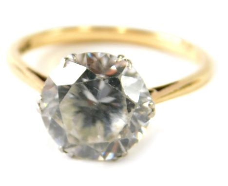 A dress ring marked 9ct and platinum set with a large paste stone, size S, 3.3g. 