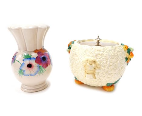 A Clarice Cliff Celtic Harvest pattern bowl, 11cm high, and a Pansy pattern table lamp. (2) 