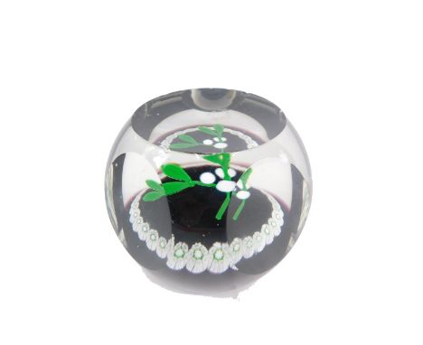 A William Mason limited edition Caithness paperweight, number 366/500, decorated with flowers in green, white, black and clea