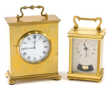 A Metamec brass cased carriage clock, with Roman numeric dial and visible pendulum with quartz movement and swing handle, 13c