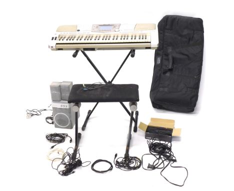 An Edifier speaker, Artist Series Moto Phones Audio Technica box, PSR2100 Yamaha keyboard, 100cm long, in outer case with sta