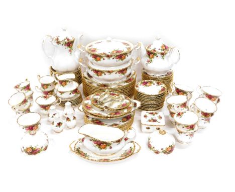 A comprehensive Royal Albert Old Country Roses dinner service, to include two lidded tureens, 12 dinner plates, coffee pot, 2