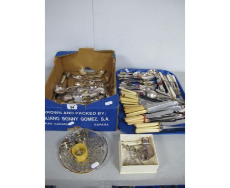 A Mixed Lot of Assorted Plated Cutlery, including mother of pearl handles, pierced trivet, napkin rings, USA One Dime coins, 