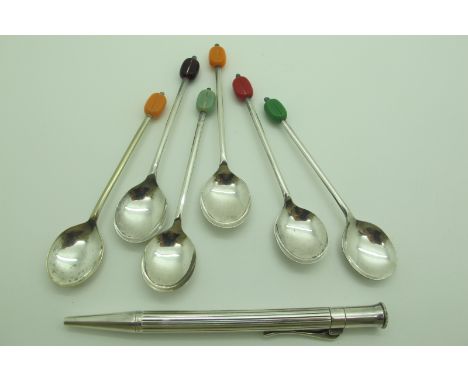 A 'Graf Von Faber Castell' Pen, of engine turned design; together with a set of six harlequin coffee bean spoons, with variou