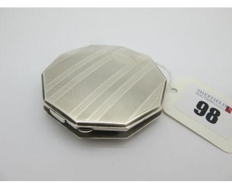 A Hallmarked Silver Compact, of decagon form, allover engine turned decoration, with internal mirror (overall weight 47grams)