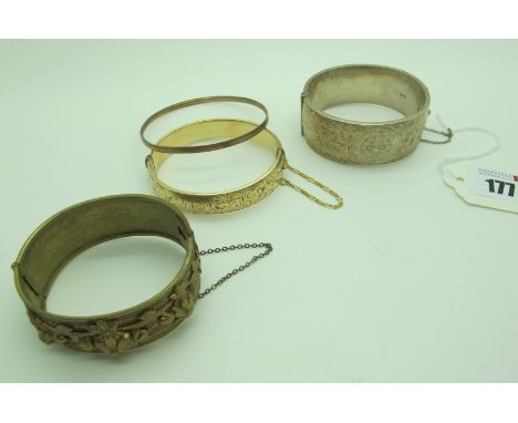 A Wide Hallmarked Silver Hinged Bangle, decoratively engraved to the front, hinged to snap clasp; Together with A Vintage Wid