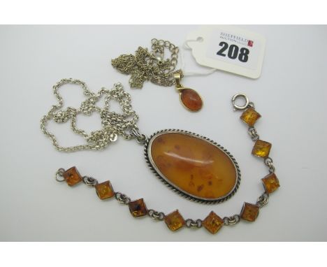 A Modern 9ct Gold Amber Pendant, together with a large oval amber pendant on a chain; a modern bracelet etc. 