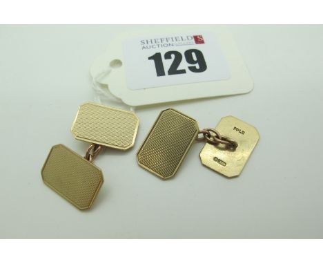 A Pair of 9ct Gold Cufflinks, the engine turned rectangular panels on chain connections (5.5grams). 