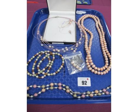 A Pair of Honora Pink Fresh Water Pearl Earrings, stamped "925"; a long single strand pink fresh water pearl bead necklace, a