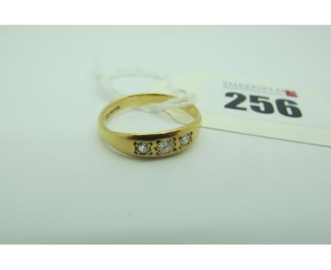 An 18ct Gold Victorian Style Three Stone Diamond Set Ring, set with old and brilliant cut stones (finger size O) (2.6grams). 