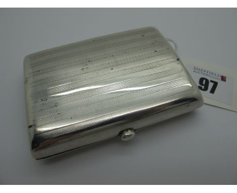 A Hallmarked Silver Cigarette Case, of rectangular form, allover engine turned stripe decoration, inside inscribed "Derek Jul
