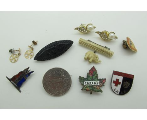 A Victorian Black Pressed Glass Bar Brooch, a pair of dainty Maltese Cross earrings, a French 1904 2 Francs coin brooch, 'Wal