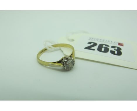 A Single Stone Diamond Ring, the old cut stone illusion set, between plain tapering shoulders, stamped "18ct &amp;Pt" (finger