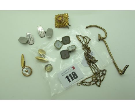 An Odd Cufflink, stamped "18ct" (3.2grams); dental gold; military badge, further cufflinks, chains etc. 