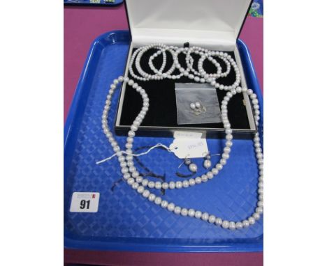 A Long Single Strand Grey Fresh Water Pearl Bead Necklace, Honora grey pearl drop earrings, stamped "925", six elasticated fr