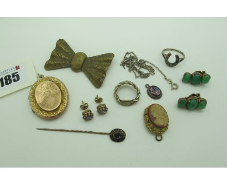 A Decorative Oval Locket Pendant, stamped "9c Gold Back &amp; Front" (dents); a vintage bow brooch, single stone earstuds, Vi