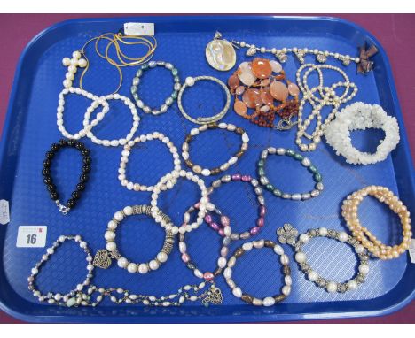 Decorative Fresh Water Pearl Bead and Novelty Charm Bracelet, an oval shell panel pendant, assorted fresh water pearl bad ela