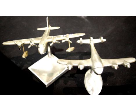 Two model metal aircraft on stands. Not available for in-house P&amp;P. 