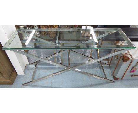 ANDREW MARTIN STYLE CONSOLE TABLE, glass top on an X framed polished metal base, 45cm D x 76cm H x 150cm W.