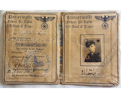 German WWII  identity pass card with a portrait of SS Tiger Tank crewman Scolhid Schulz, dated 1943. VF 