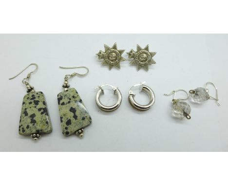 A pair of 9ct white gold hoop earrings, 2.2g, a pair of Army Service Corps earrings and two other pairs of earrings 