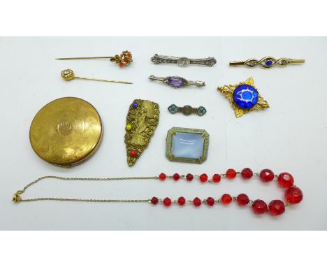 A collection of jewellery including a small blue enamel brooch, a/f, a gold plated bar brooch, two stick pins, a necklet, a 1