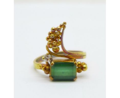 An 18ct gold, green tourmaline and white stone ring, 5.1g, L/M 