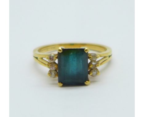 A yellow metal tourmaline and white stone ring, (tests as 18ct gold), 4.2g, R 