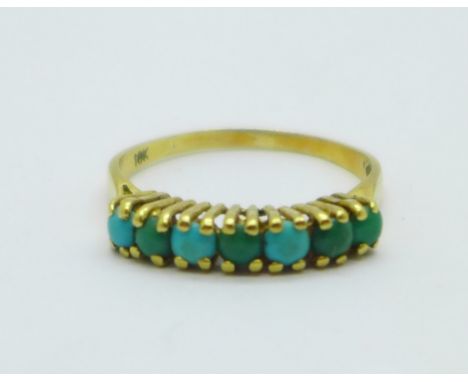 An 18ct gold, seven stone turquoise ring, 2.3g, M 