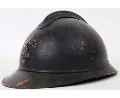 An original First World War WWI period Belgian forces metal uniform helmet. Complete with badge to front, inner liner and str