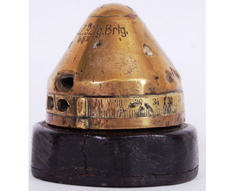 An 1892 German Shell Fuze Head Timer (Inert), solid brass, inscribed 'Dopp.Z.92lg.Brlg.Sp.16.M.' to the timer, together with 