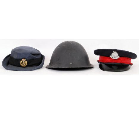 A collection of 3x military helmets/ hats to include RAF, WWII tin helmet and fire service peaked cap.&nbsp;&nbsp;POSTAGE: Wo