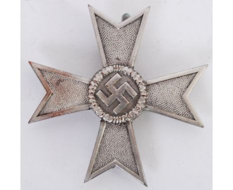 An original Second World War WWII Third Reich / Nazi Merit Cross. First class.&nbsp;POSTAGE: Worldwide postage / delivery ava
