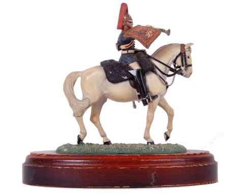 An original Buckingham Pewter made and painted metal figure of a mounted trumpeter. Highly detailed, and hand painted. Mounte