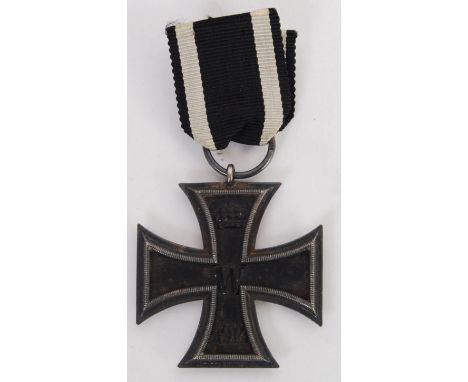 A First World War WWI German Iron Cross medal, marked with imperial crown over W over 1914, (the reverse with imperial crown 