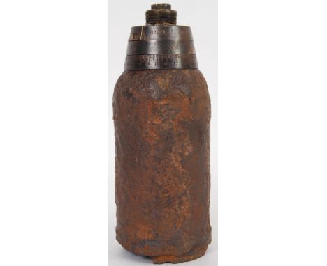 An original WWI First World WAr Artillery Shell Fuse Head Timer (Inert) with shell casing, solid brass, inscribed 'Br.10.4G 2