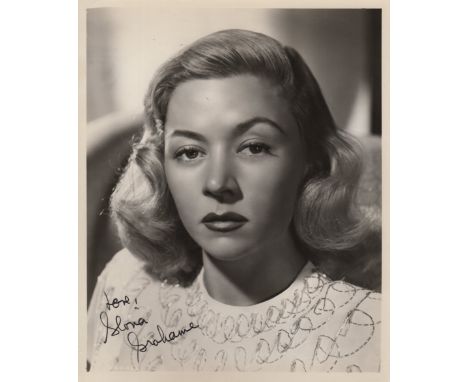 GRAHAME GLORIA: (1923-1981) American Actress, Academy Award winner. Signed 8 x 10 photograph of Grahame in a head and shoulde