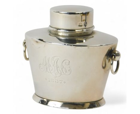 A Victorian silver tea caddy, of oval shape, engraved monogram and dated 1907, with ring handles, Birmingham 1899, 3.46oz.