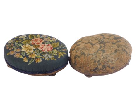 A pair of Victorian mahogany footstools, each of oval form, one with a tapestry top, on compressed ball feet, 10cm high, the 