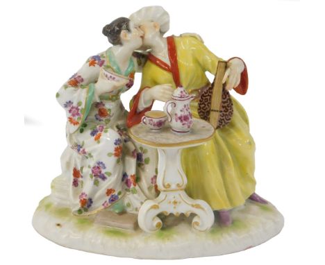 A Meissen porcelain figure group, modelled as a seated gentleman wearing a yellow robe and playing a lute beside a lady weari