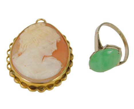  Two items of jewellery, comprising a shell cameo pendant, in a rub over frame with petallated border, 3cm x 2.5cm, yellow me