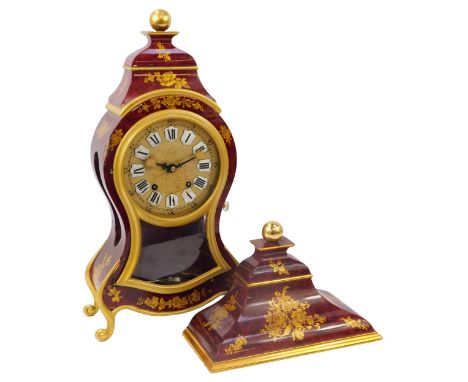 A 20thC Zenith balloon bracket clock, the circular brass dial with raised enamel Roman numeric dial, with further Arabic nume
