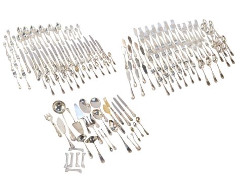 A part suite of cutlery, each metal handle cast with scrolls, leaves, etc., to include dinner knives, forks, tablespoons, tea