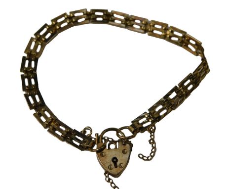 A 9ct gold gate bracelet, of three bar design, with a heart-shaped padlock and safety chain, 18cm long, 8.9g. (AF)