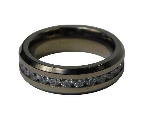 A titanium and diamond eternity ring, the channel set diamonds on a white metal band stamped titanium, ring size N, 3.6g all 