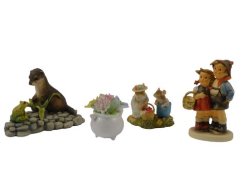 A Border Fine Arts figure group, modelled as an otter beside a toad, 9cm high, (AF), together with a Hummel figure group mode