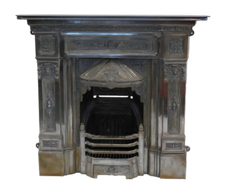 A Victorian and later cast iron fire surround, with grate, decorated in a grey lustre finish, 105cm high, 114cm wide.
