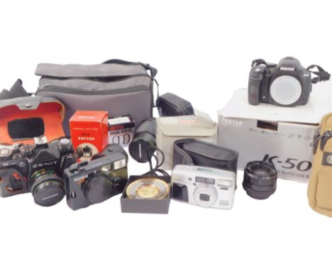 Camera equipment, comprising Pentax K50 camera, Zenit, an Epsom 145M, a Tamrac digital camera, Olympus digital camera, and va